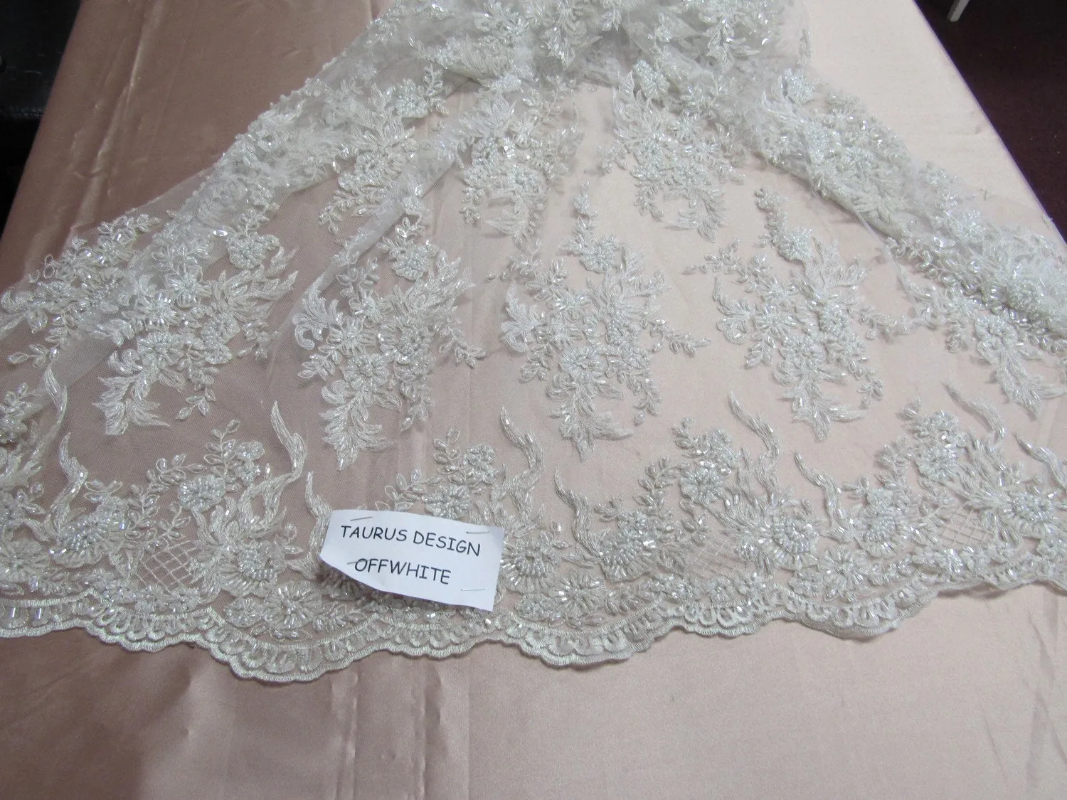 Gorgeous off white French design embroider and beaded on a mesh lace. Wedding/Bridal/Prom/Nightgown/dresses/fashion/sold by the yard.